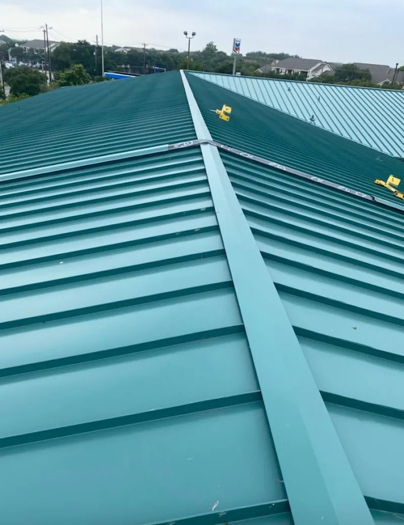 Green commercial metal roof ridge and valley for Metal Roof Repair in Lindstrom